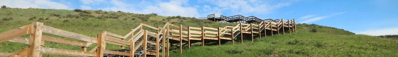Web design in Sunset Ridge, Cochrane, Alberta — Sunset Ridge, Cochrane Alberta — north-of-highway community with 6-acre freshwater pond and 5km of connected pathways