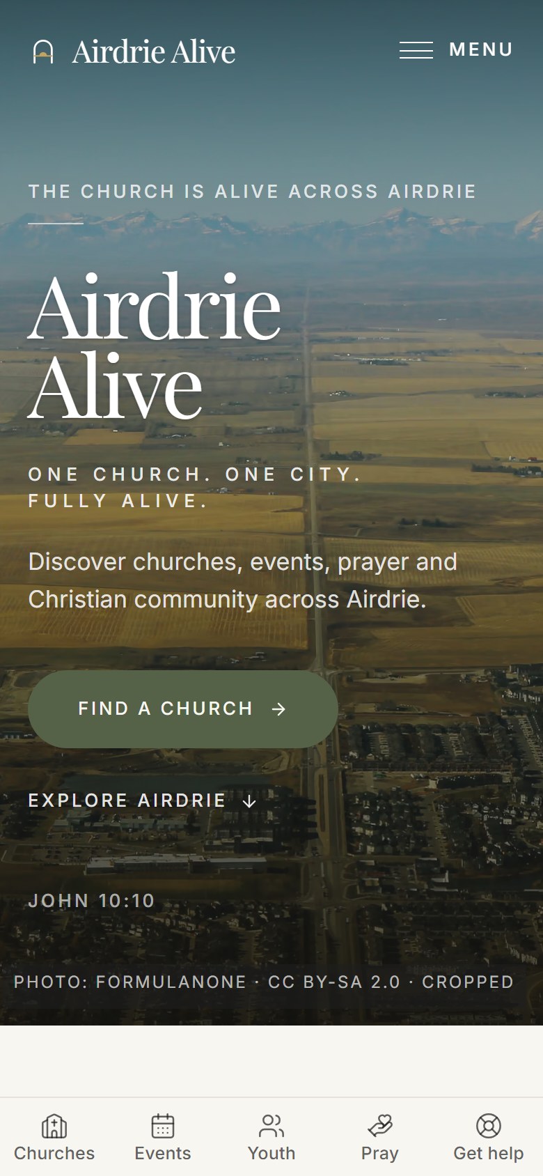 Airdrie Alive website on a phone — the One Church, One City, Fully Alive hero with Find a Church in the thumb zone