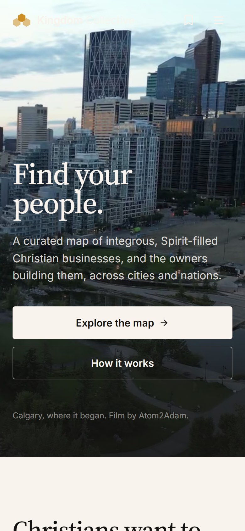 Kingdom Collective website on a phone — the Find Your People hero over aerial film with Explore the Map in the thumb zone