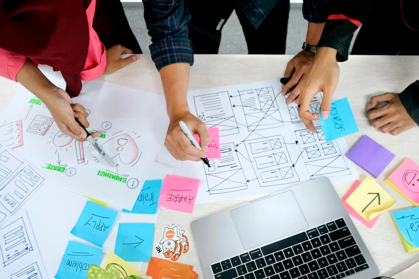 UX wireframes on a tablet during accessibility planning for a Cochrane small-business website
